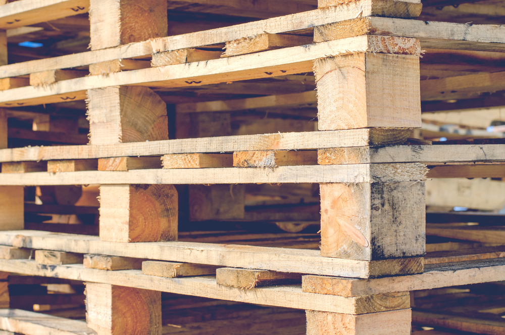 Wooden Pallet Overlap in Warehouse for Shipment