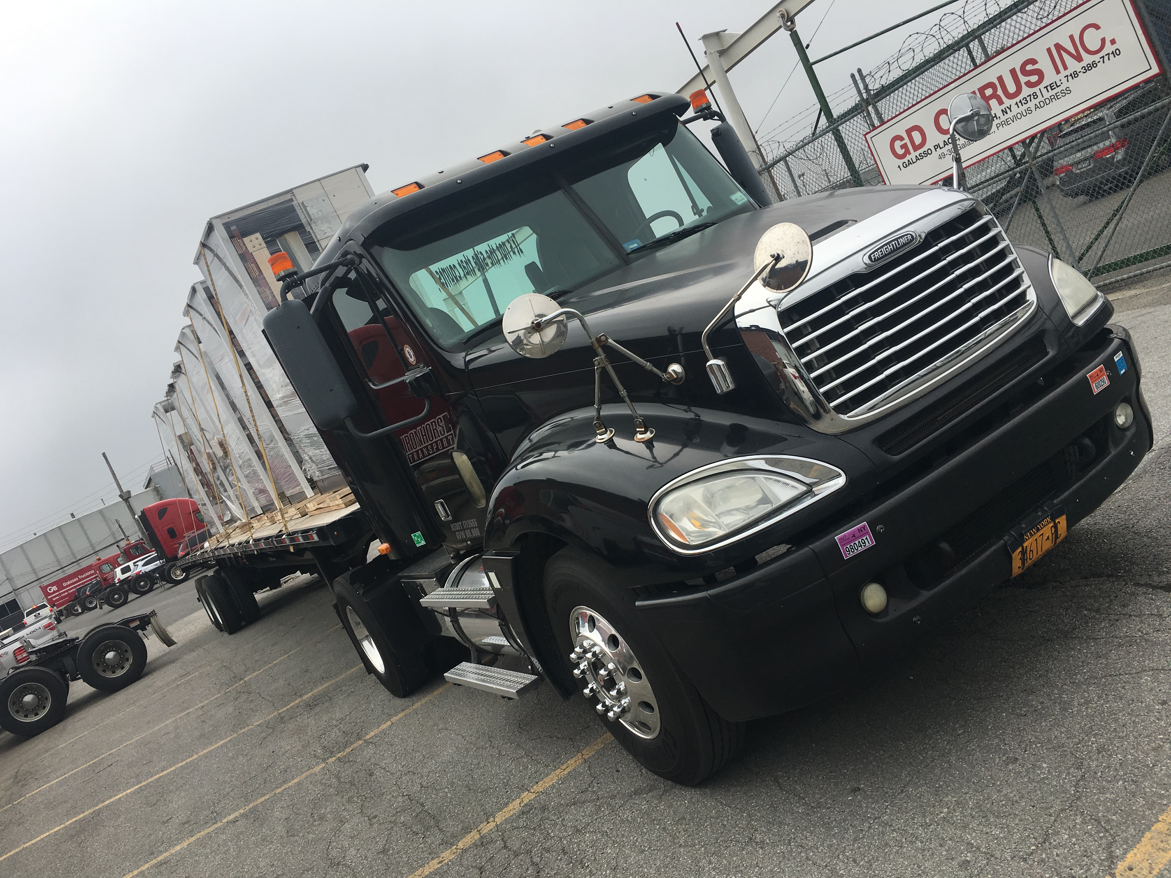 Black flatbed truck