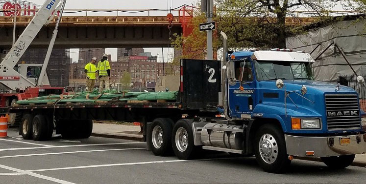 Flatbed truck in New York waiting for materials to be loaded 