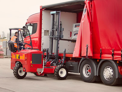 forklift unloading a truck 