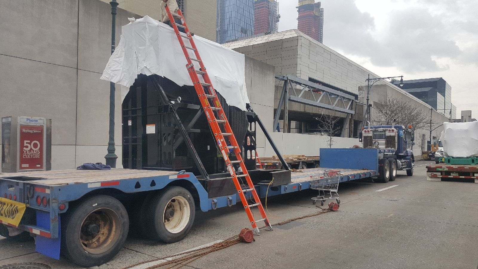 NYC step deck stretch trailer