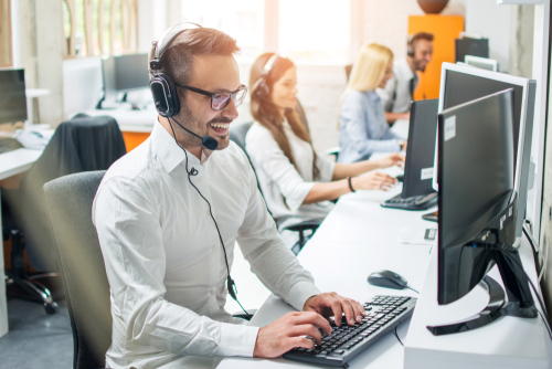 person at computer in office